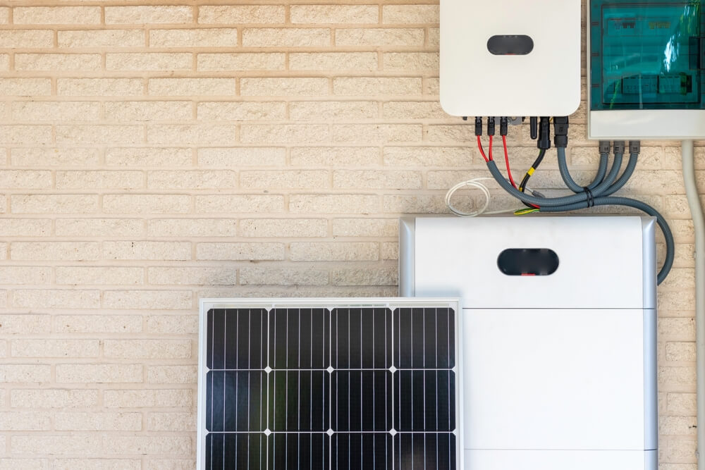 Front,View,Of,Photovoltaic,Panel,And,Battery,Instalation,Leaning,On